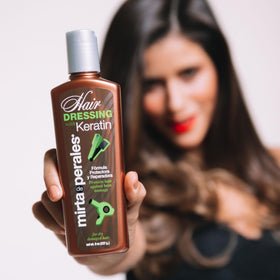 Mirta De Perales applying on damp hair demonstrates detangling and easy styling.