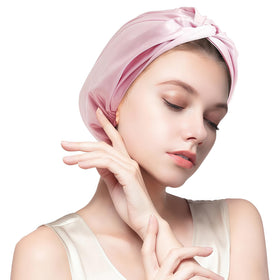 MISF pink silk bonnet front view showing soft, smooth surface for gentle sleep