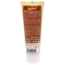 Miss Jessie's Honey Sweet and Nice conditioner in use, smoothing hair and easing tangles.