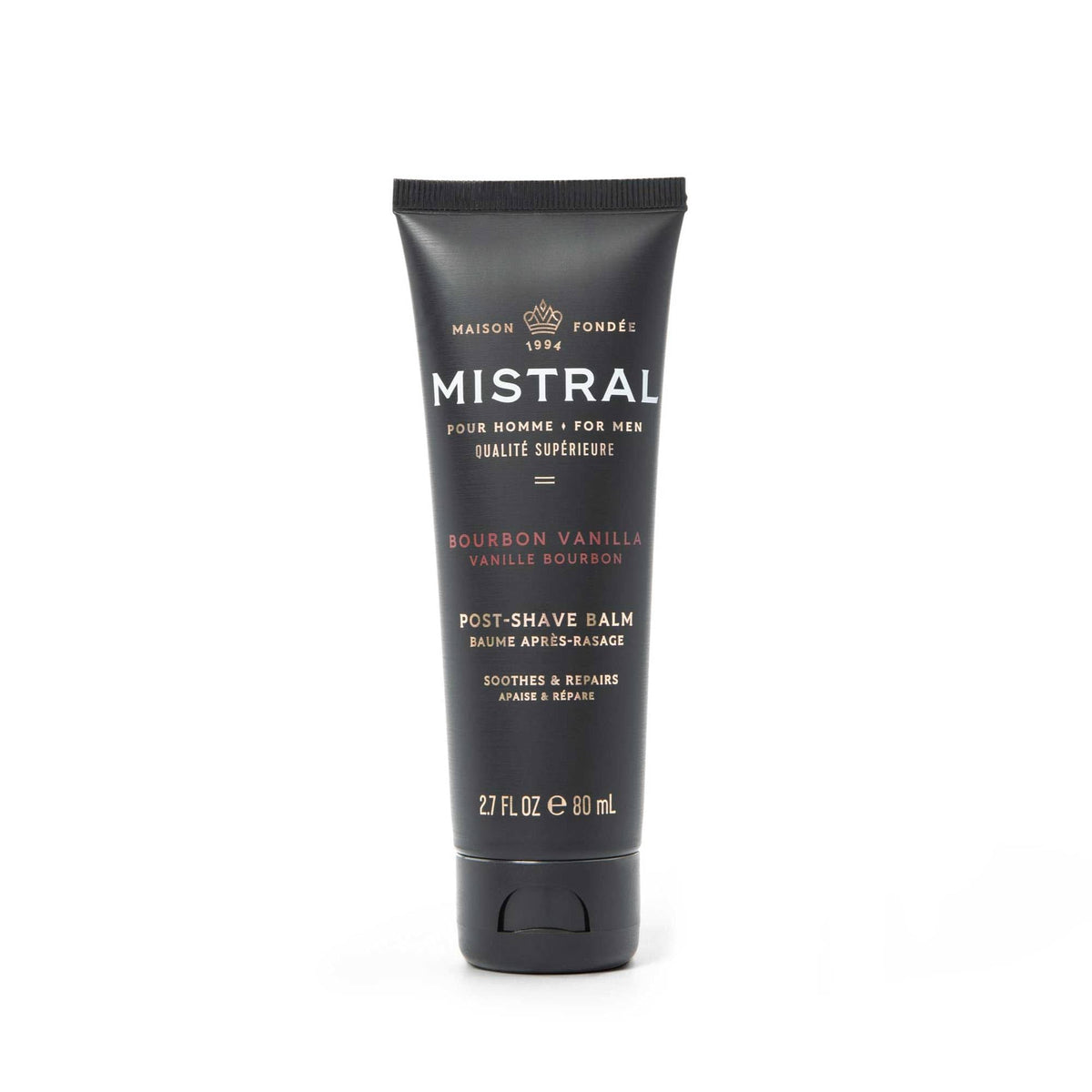 Mistral Bourbon Vanilla balm bottle on a clean shelf with quick-absorbing hydration.
