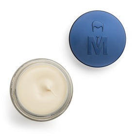 Mister Pompadour Beeswax Paste scoop on fingers demonstrates easy application
