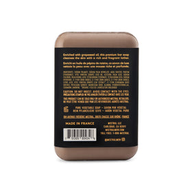 Mistral Teak Wood bar soap texture close-up showing firm bar