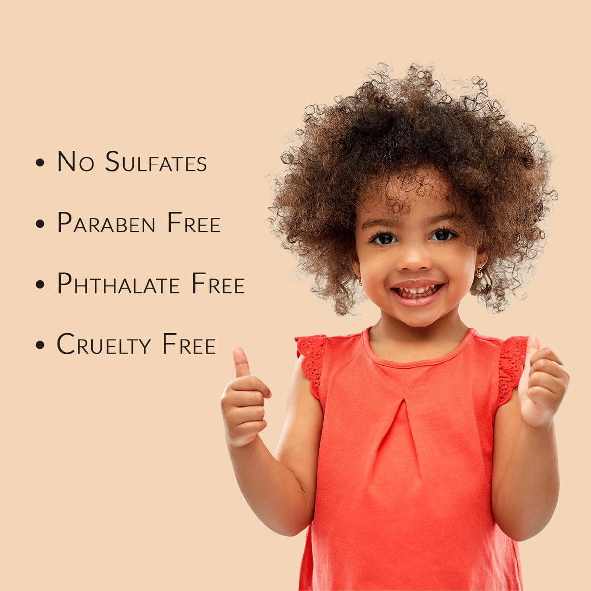 Mixed Chicks Kids Tangle Tamer application on curls for soft, defined hair.