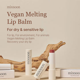 Applying Mixsoon lip balm with a smooth glide for instant comfort.