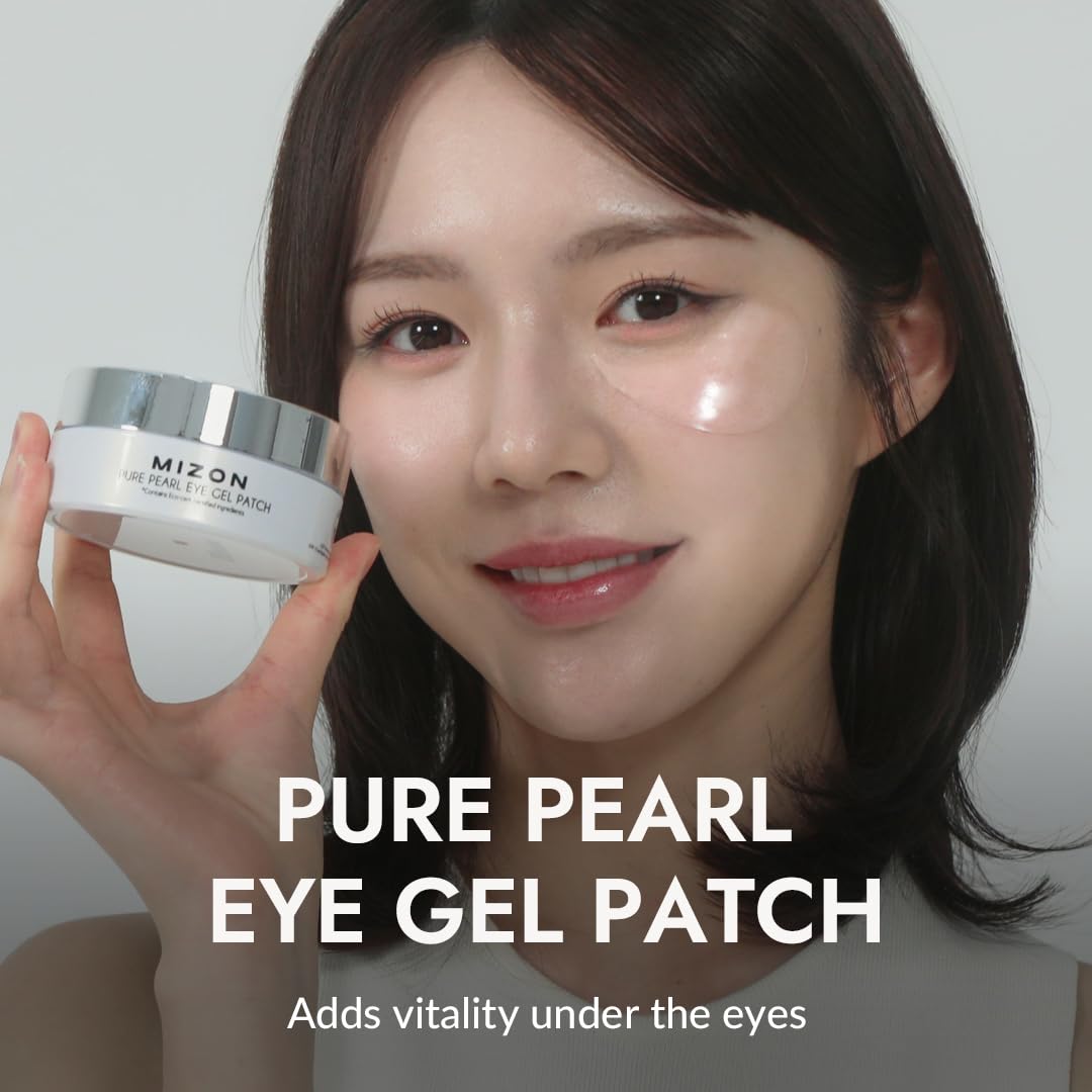 MIZON Pure Pearl Eye Patch being applied under the eye for quick refreshment.