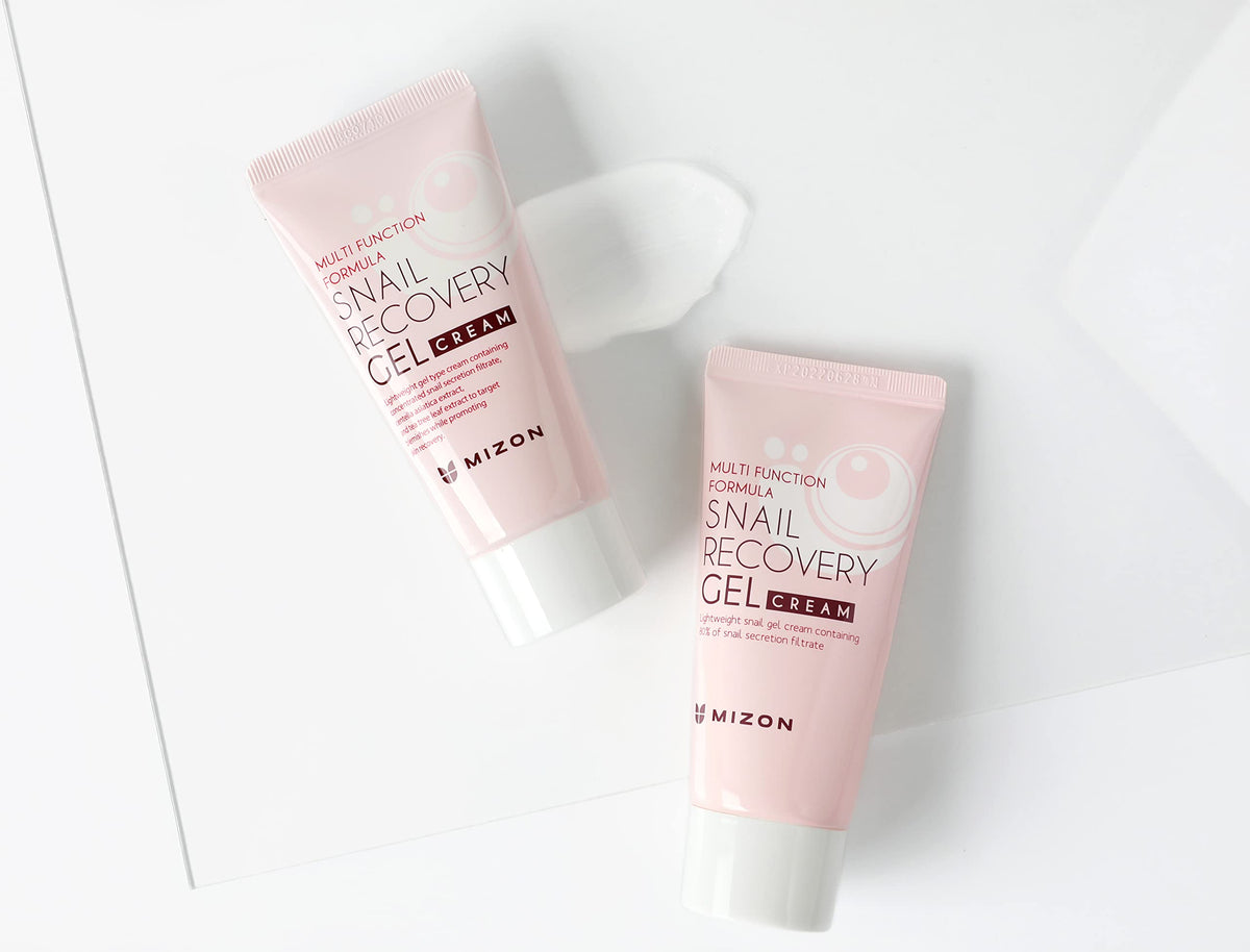 MIZON snail gel cream being spread on skin illustrating smooth, hydrated finish.