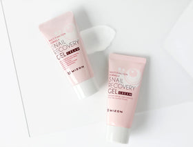 MIZON snail gel cream being spread on skin illustrating smooth, hydrated finish.