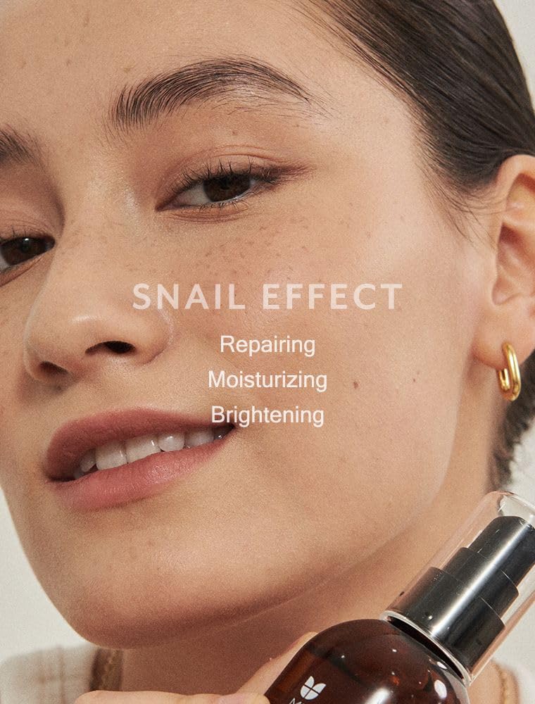 MIZON Snail Repair Intensive Essence pump close-up for even dispensing.