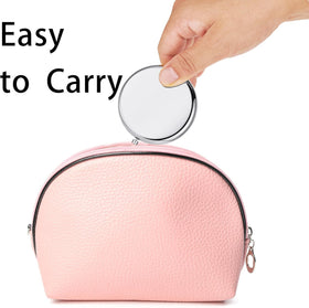 MLLXX closed compact mirror designed for discreet everyday carry.