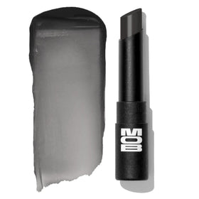 MOB Beauty Hydrating Shine Lip Balm M138 black tint in a sleek tube, glossy moisture on lips