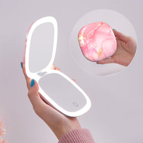 Mocado compact LED travel mirror front view with even illumination for quick makeup checks.