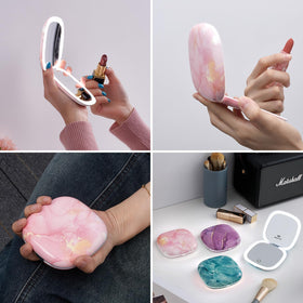Mocado pink marble shell travel mirror designed for purse and travel readiness.