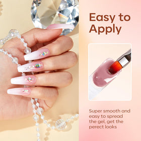 Modelones nail extensions in progress for a DIY home manicure.