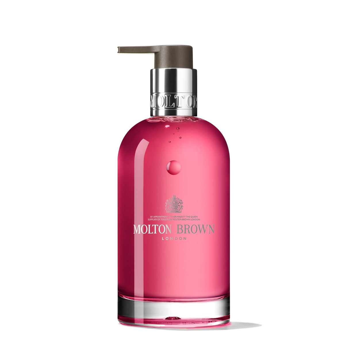 Molton Brown Fiery Pink Pepper bottle close-up showcases sustainable luxury hand care.