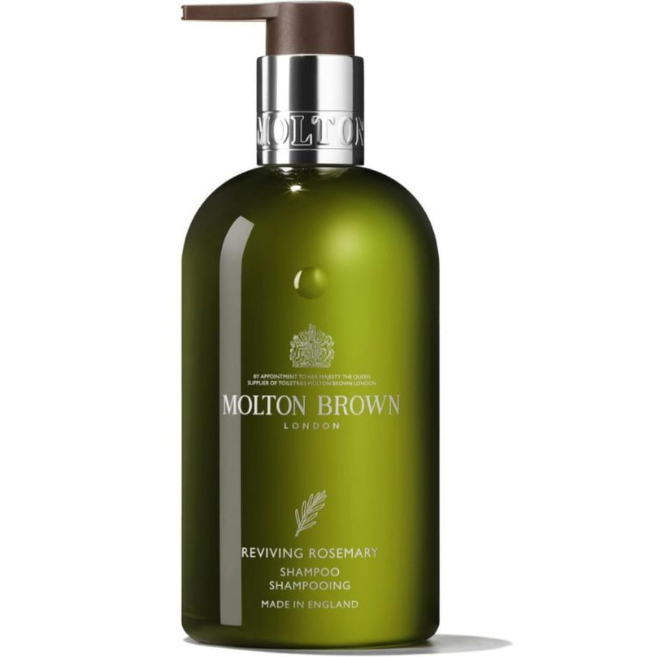 Molton Brown Reviving Rosemary Shampoo bottle highlights rosemary fragrance and gentle cleansing.