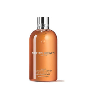 Molton Brown Sunlit Clementine & Vetiver body wash bottle for a refreshing cleanse.