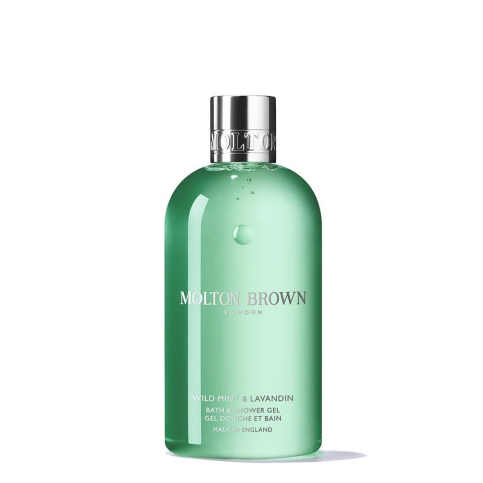 Molton Brown Wild Mint & Lavandin bottle foreground for invigorating mornings