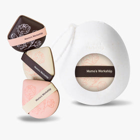 Momo's Workshop Rose Series pink-brown puff for smooth, even application.