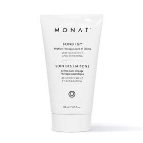 MONAT BOND IQ creme bottle closeup highlighting bond-building protection for smoother hair.
