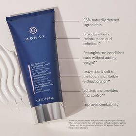 Application on damp hair using MONAT Curl Perfection Cream for smooth, frizz-controlled curls.