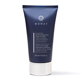 MONAT Damage Repair Bond-Fortifying Hair Creme bottle shows frizz control and shine.