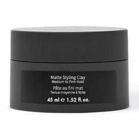 MONAT Matte Styling Clay bottle front shows all-day hold for textured hair