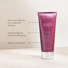 Applying MONAT conditioner demonstrates detangling and soft feel.