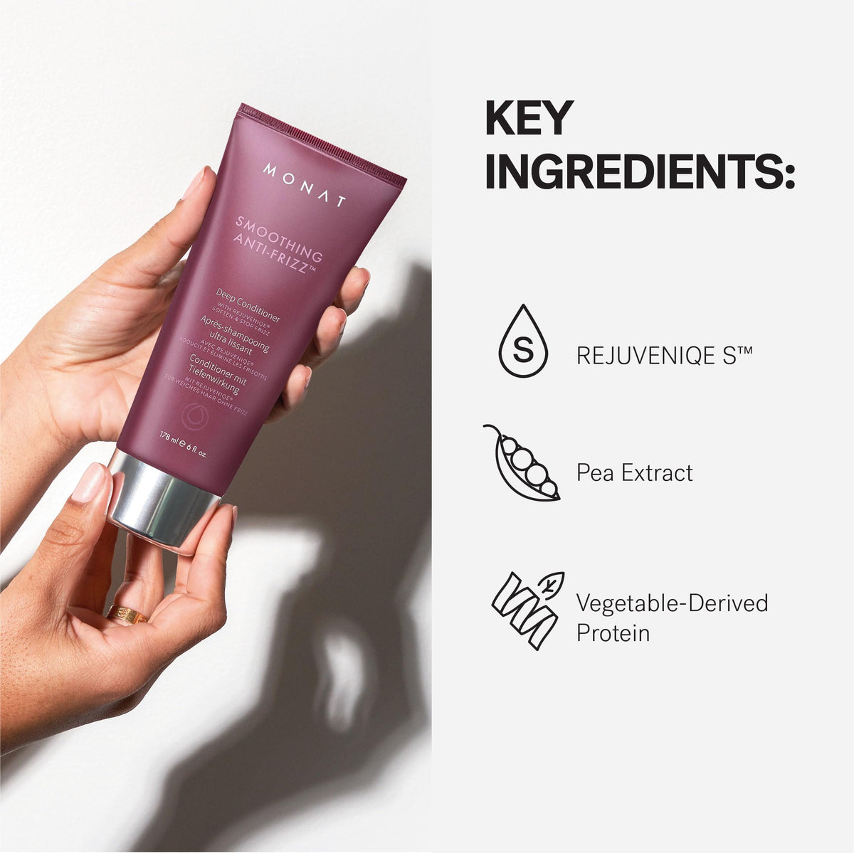 Packaging close-up highlighting long-lasting frizz control claim on MONAT product.