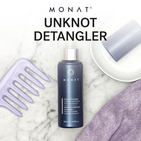 MONAT Unknot Detangler mist on hair provides smooth, manageable strands