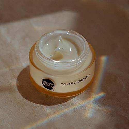 Moon Juice Cosmic Cream texture close-up emphasizes a smooth, dewy finish.
