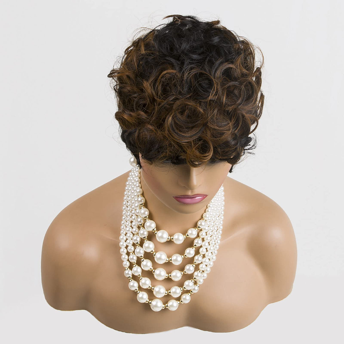 Moonshow pixie wig with curly top and tapered back for versatile daily style.