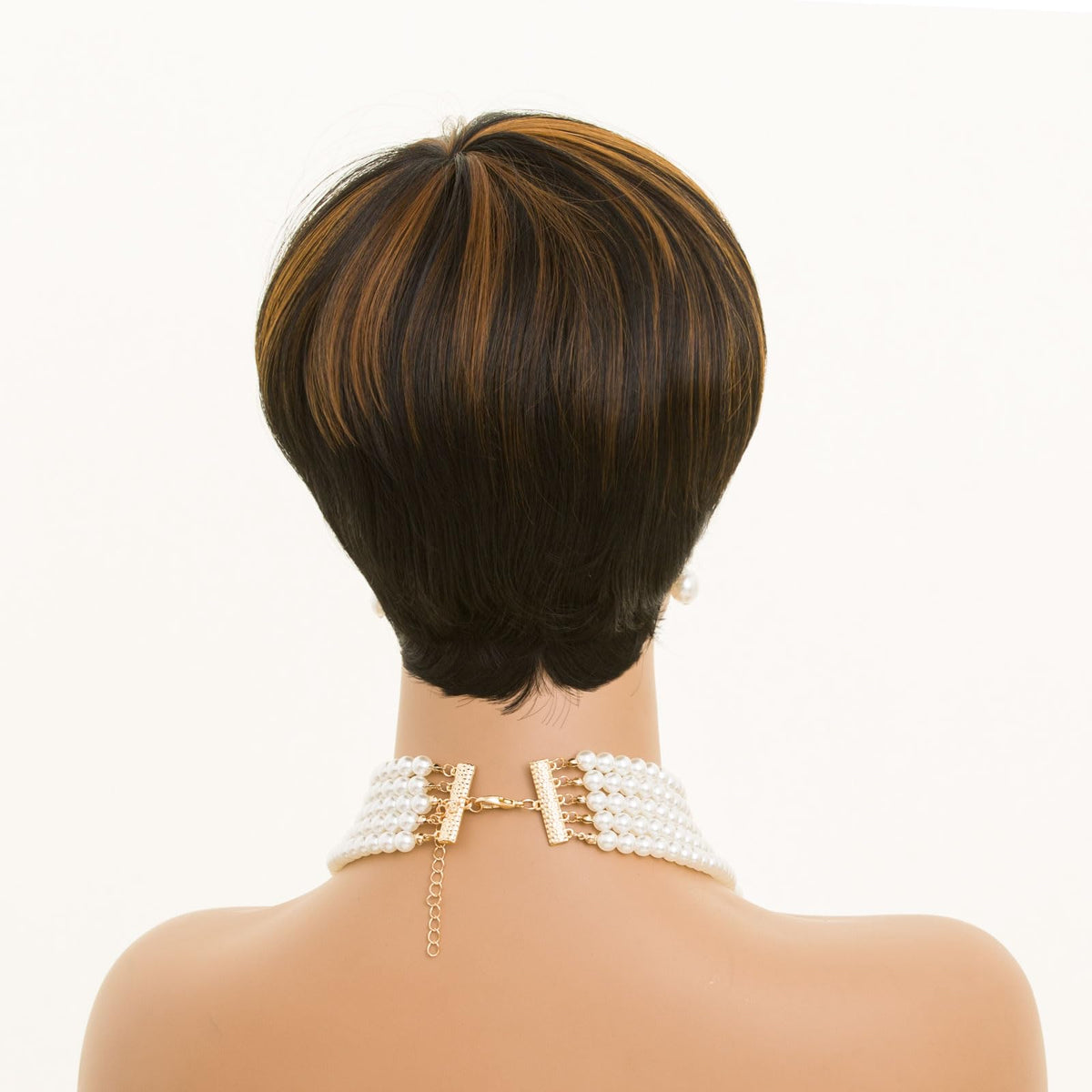 MOONSHOW Pixie Wig face-framing detail enhances cheekbones with subtle volume.