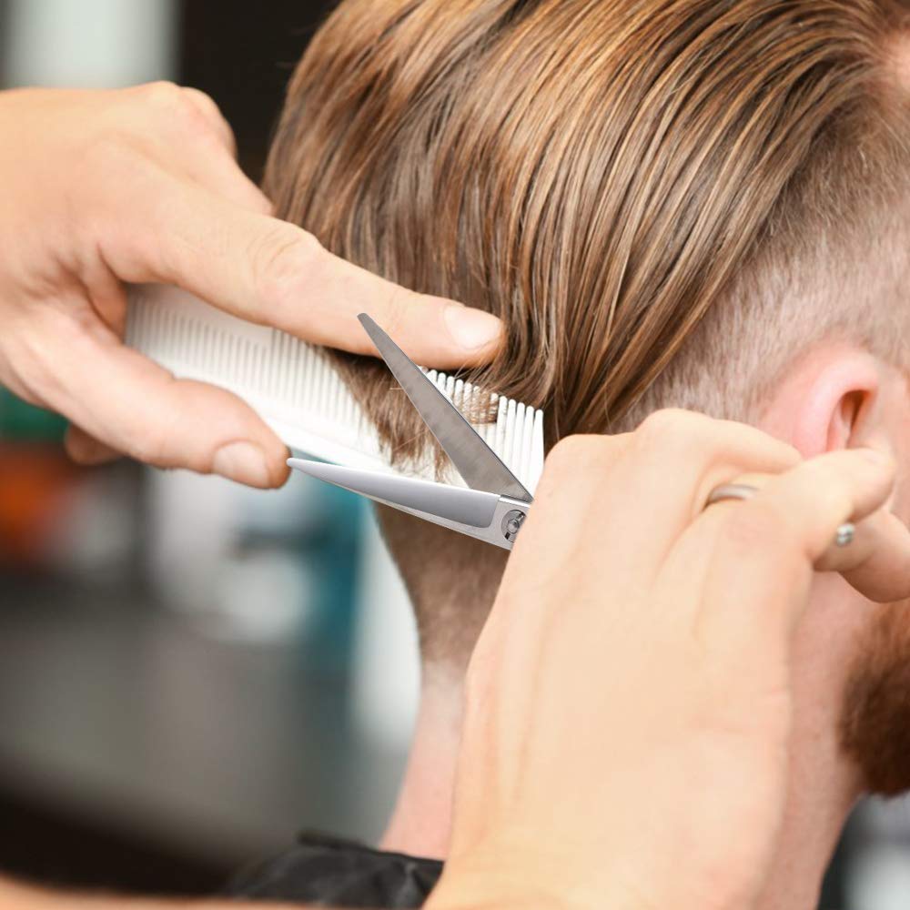 Silver Moontay professional barber scissors highlight a durable, balanced tool.