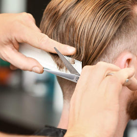 Silver Moontay professional barber scissors highlight a durable, balanced tool.