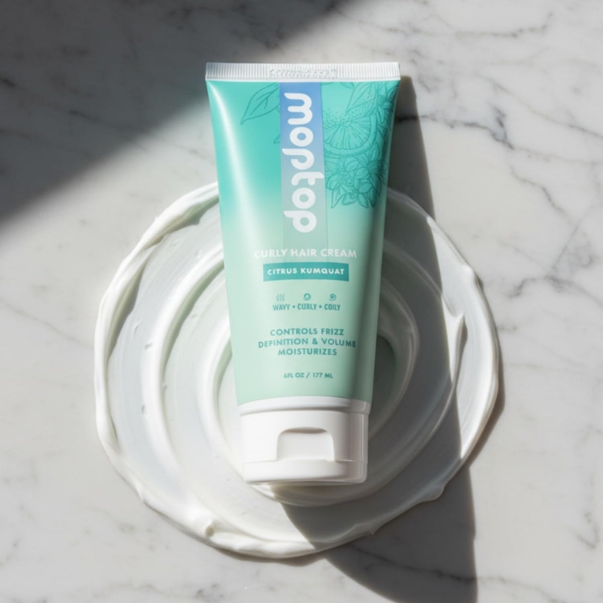 MopTop Curl Cream packaging close-up highlights clean ingredients for healthy curls