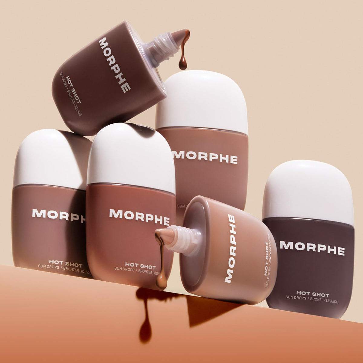 Morphe Hot Shot Sun Bronzing Drops bottle shaken before use to activate color