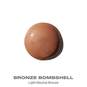 Morphe Hot Shot Sun Bronzing Drops swirled onto skin for bronze finish