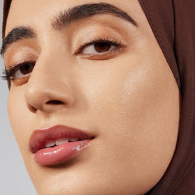 Morphe Lightform swatch on skin shows dewy, natural glow.
