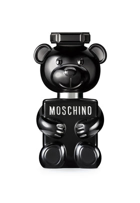 Moschino Toy Boy bottle close-up with a glossy teddy bear design for bold style.