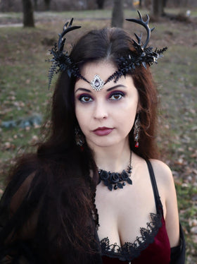 MOSTORY Dark Reindeer Crown with faux florals for woodland fae vibe