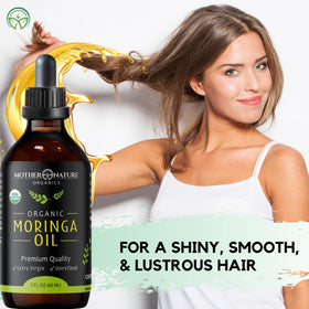 Mother Nature Organics Moringa Oil label display emphasizing organic purity.