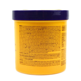 Motions Professional Hair Relaxer Smooth and Silken Super hands applying for even coverage