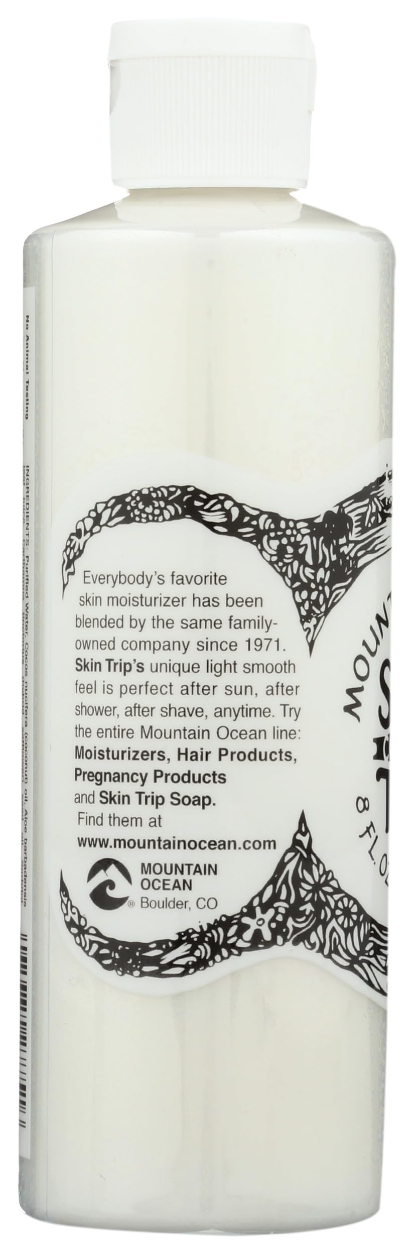 Mountain Ocean Skin Trip Coconut Moisturizer resting in a bathroom setting for post-shower care