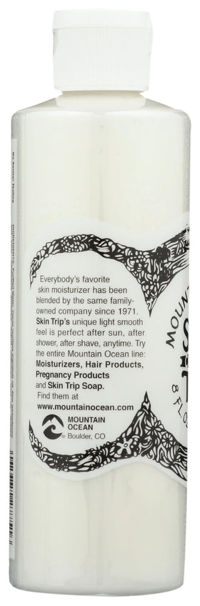 Mountain Ocean Skin Trip Coconut Moisturizer resting in a bathroom setting for post-shower care