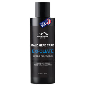 Mountaineer Brand natural bald head exfoliator bottle close-up showing pure ingredients for a clean feel
