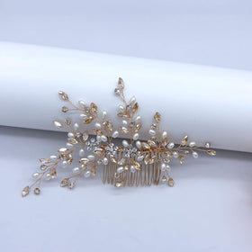 Mpoikba champagne wedding headpiece closeup showing intricate design