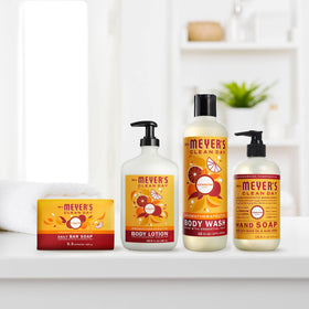 Clementine bar soap by Mrs. Meyer's in a bright display.