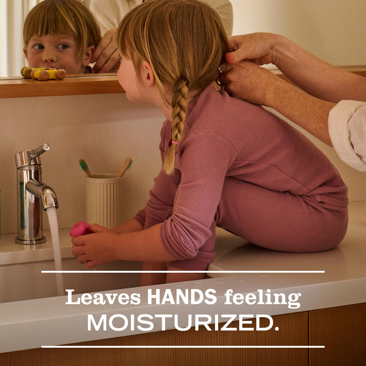 Mrs. Meyer's Clean Day Plum Blossom bottle releases a sweet fragrance while cleansing.