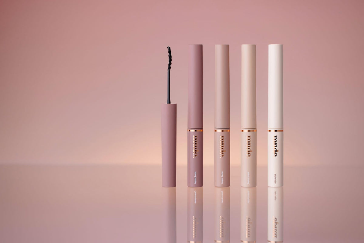 mude Inspire Skinny Curling Mascara being applied to lashes to deliver curl and volume