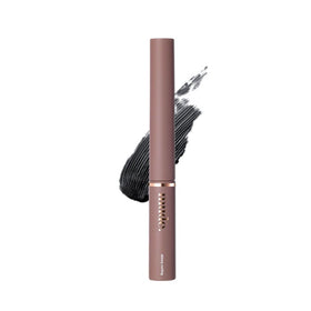 mude Inspire Skinny Curling Mascara bottle close-up highlighting waterproof formula for all-day wear